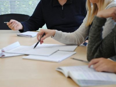 a few people working at a table