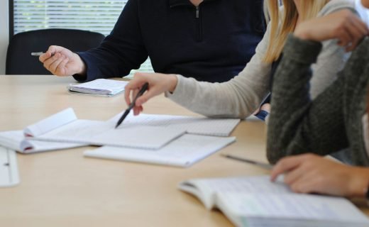 a few people working at a table