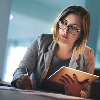 AML analyst reviewing transaction monitoring alerts