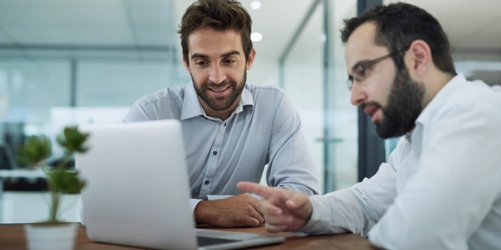 Explaining,The,Best,Strategy.,Shot,Of,Two,Businessmen,Having,A