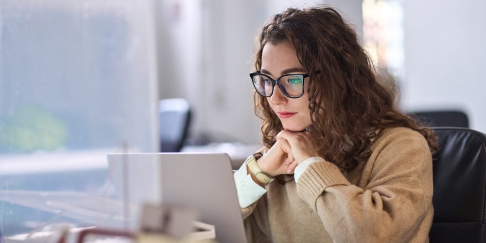 Young,Serious,Busy,Professional,Business,Woman,Employee,Or,Student,Using