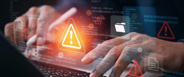 Cybersecurity,Threat,Warning,Concept,With,Developer,Analyzing,System,Code,On