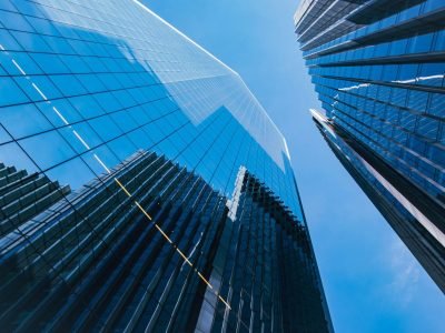 a couple of tall buildings that are next to each other