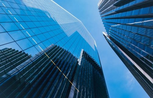 a couple of tall buildings that are next to each other