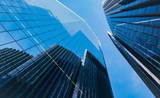 a couple of tall buildings that are next to each other